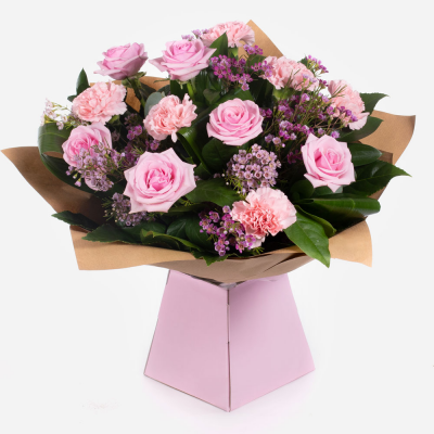 Strawberry Twist
 - This sweet arrangement of roses with carnations and foliage to compliment. Your recipient is sure to be overjoyed at such a heartfelt statement.