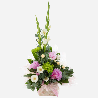 High Rise  - This stunning arrangement is sure to inspire flower lovers everywhere. Featuring bold and beautiful peonies along with a harmonious selection of complementary flowers.