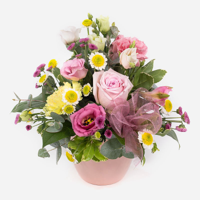 Pot of Happiness - A small but choice selection of flowers arranged in a petite container. Perfect for that token gift.