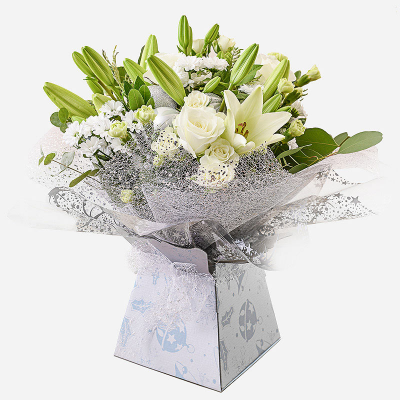 Ava - A creamy selection of blossoming buds in shades of white, complimented by greenery and carefully hand-tied. Beautifully presented, only the perkiest petals make up this creation. Include a message for that personal touch.
