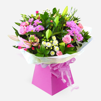 Ashleigh  - A budding delight, complimented by greenery and presented in a gift box/bag. Beautiful flower bouquet hand delivered by the local florist.       
