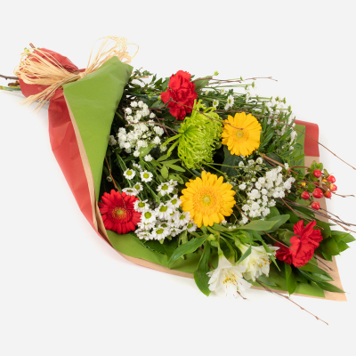 Christmas Charm - This simply wrapped collection of flowers is the perfect way to send your message of good wishes.